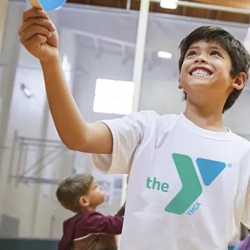 Child enjoying our Y gymnasium.